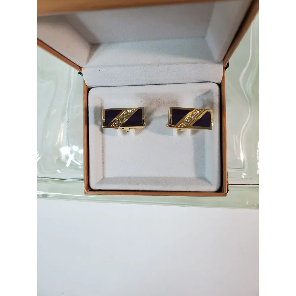 The Cufflinks are gold-toned with purple inlay Great Gift
